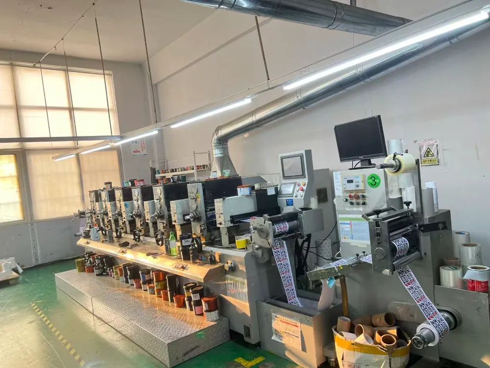High-precision multi-head inkjet printing line producing Strong Adhesive Electronic Device Label batch at Xinsen Packaging